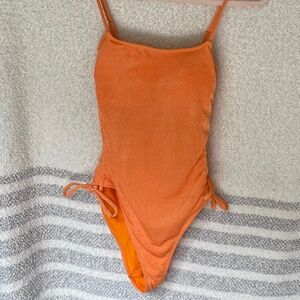 NWT Charlie Holiday orange one-piece, XS